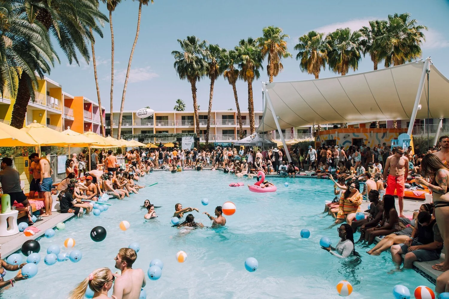 A sun-filled Wicked Paradise party by the pool